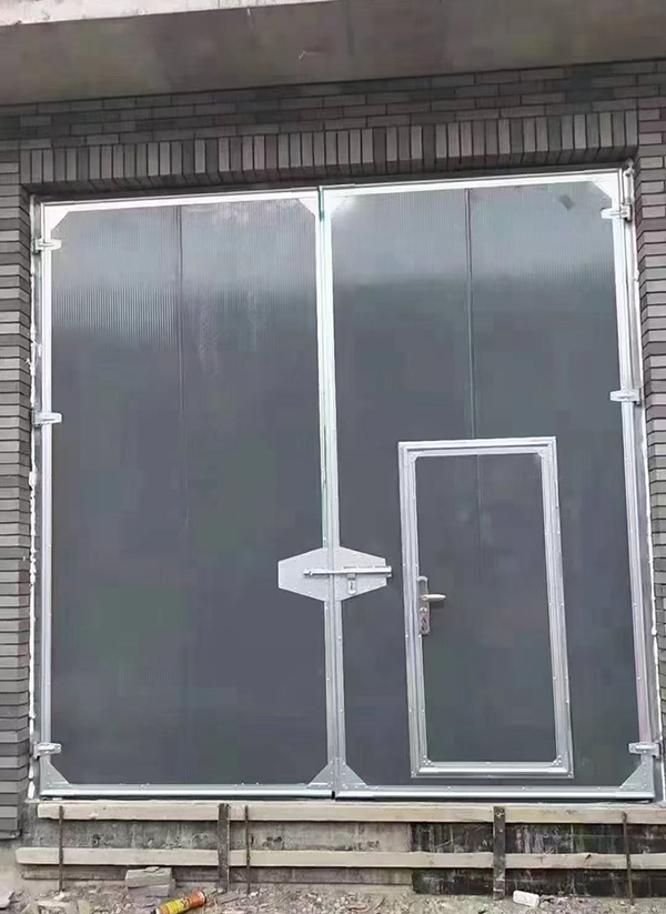 麦盖提工业平开门在大型设备制造车间的应用实例